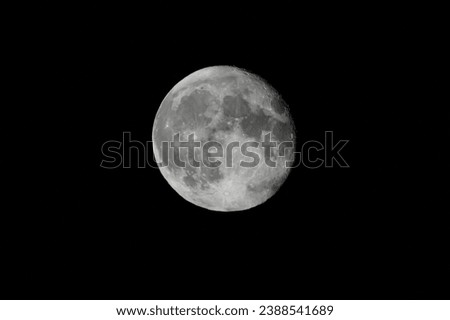 Silver surface during a full supermoon