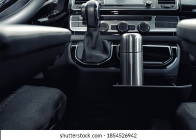 Silver Thermos In Holder Inside Of Car