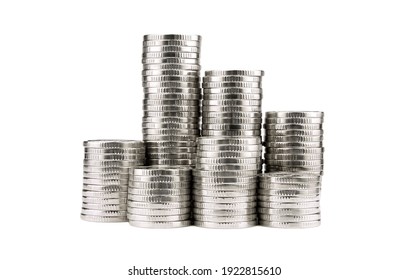 Silver Towers Made Out Of Coins Isolated On White