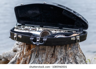 The Silver Vintage Sax In The Case Outdoors