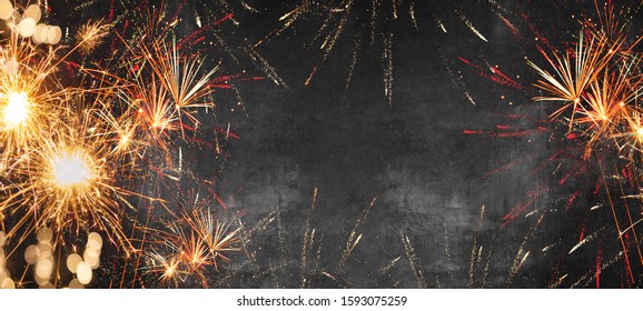 Silvester background - firework on rustic dark black grey stone concrete texture, with space for text