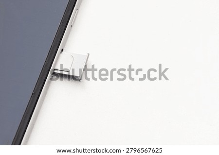 SIM Card Tray Ejecting from Smartphone Side View