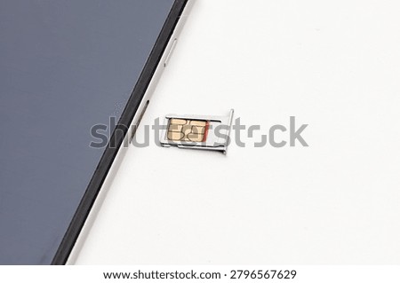 SIM Card Tray Ejecting from Smartphone Side View
