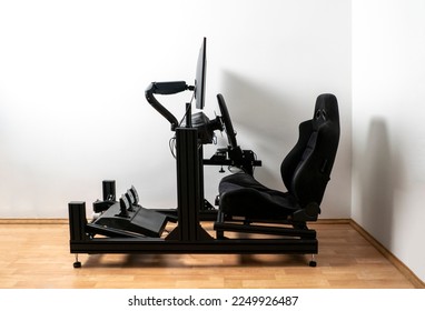 sim racing cockpit, auto simulator seat, playing video games - Shutterstock ID 2249926487