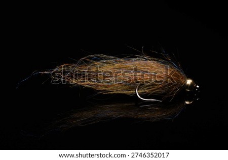 Simi Seal Leech a small streamer or large nymph for fly fishing. color pictured is Canadian Olive