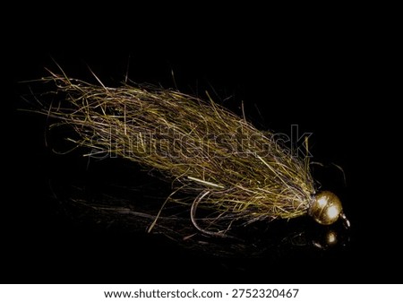 Simi Seal Leech a small streamer or large nymph for fly fishing. Color pictured is Peacock