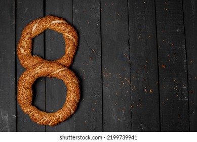 Simit, Traditional Turkish Bagel, Breakfast, On A Black Wooden Table, No People