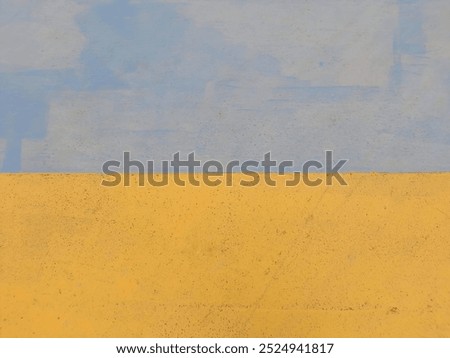 A simple abstract composition featuring two bold colors, yellow and blue, divided horizontally with minimal texture.