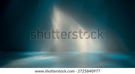 Simple abstract light blue background for product presentation with sunny light reflections shadow on wall.