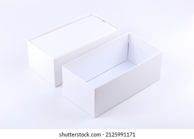 Simple blank white opened empty smartphone box premium quality paper mobile phone technology product container isolated on white background, cut out, open box template mockup, nobody. Unboxing concept