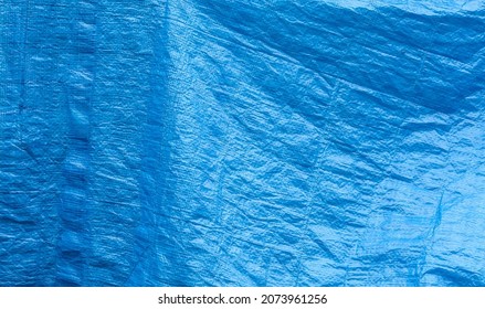 Simple Blue Plastic Tarp, Woven Crumpled Plain Used Protective Industrial Tilt Curtain Abstract Background Texture, Object Closeup, Nobody, Backdrop Bright Material Structure Up Close, Design Elements