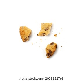 Simple crumbled cookie isolated. Broken oatmeal sugar bitten cookies, chocolate chip biscuit pieces. Round broken biscuit top view