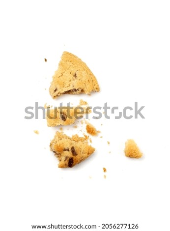 Simple crumbled cookie isolated. Broken oatmeal sugar bitten cookies, chocolate chip biscuit pieces. Round broken biscuit top view
