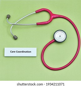 Simple Design Of Care Coordination Concept Of Pink Stethoscope On Green Background