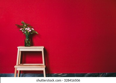 Simple Design Of Interior, Flowers In Vase On Red Wall Background