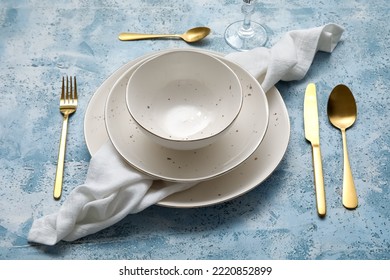 Simple Dinnerware On Blue Table