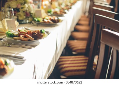 Simple And Elegant Restaurant Table Of Food. Catering Services Background With Healthy Food. Wedding Appetizer Table.