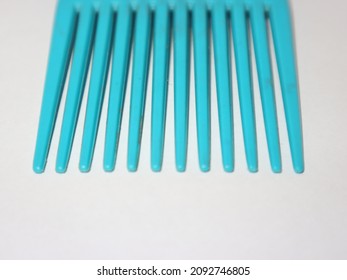 Simple Flat Afro Hair Comb. Copy Space