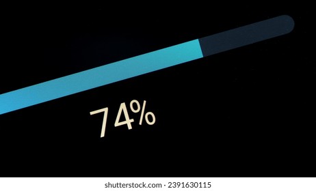 Simple generic blue loading downloading uploading or system update progress bar object detail, display monitor extreme closeup macro, nobody. Percentage going up finishing transfer updating os concept