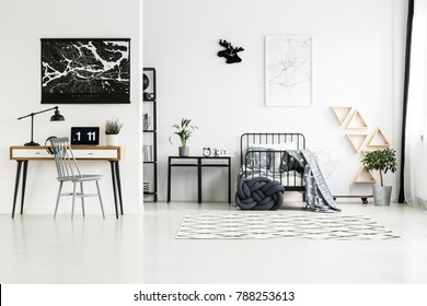 Simple Gray Chair Standing At A Wooden Desk In Monochromatic Bedroom For A Teenager