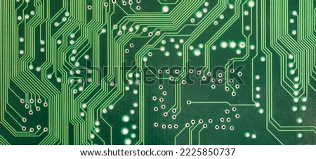 Simple green PCB, circuit board lines, paths abstract background texture, backdrop, nobody, wide shot, object detail, extreme closeup. Electrical connections, circuits, technology, engineering concept