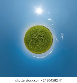 simple green tiny planet without buildings in blue sky with beautiful clouds. Transformation of spherical panorama 360 degrees. Spherical abstract aerial view. Curvature of space. - Powered by Shutterstock