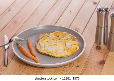 Simple Healthy Low-calorie Slimmer Meal. Chicken Omelette With Baby Carrots. Bland And Slightly Boring But Nutritional Organic Food. Quick And Easy Lunch.