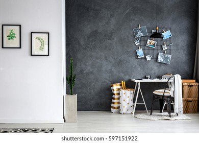 Simple Home Office With Grey Wall, Desk And Chair