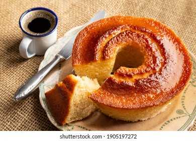 simple homemade cake known as casserole cake, with a cut piece on top of an old plate on top of the jute with a knife beside it, selective focus
 - Shutterstock ID 1905197272