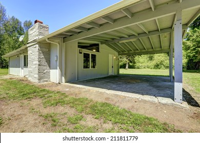 Simple House Exterior With Walkout Basement And Vaulted Roof