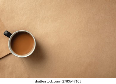 A simple, inviting image of a coffee mug viewed from directly above, placed on a neutral, textured surface.