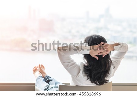 Simple life style relaxation with Asian working business woman healthy lifestyle take it easy resting in comfort hotel or home living room having free time with peace of mind and self health balance