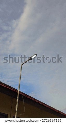 It's a simple light fixture, but it effectively illuminates the entire hallway.