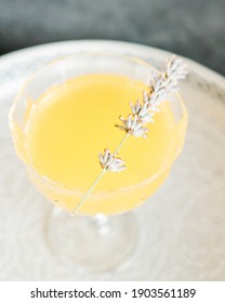 Simple Limoncello Cocktail With Lavender On A White Tray 