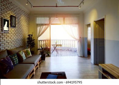 Simple Living Room With Beach Chair Table At The Balcony Facing The Sea Of Malacca Straits At Selangor, Malaysia On May 28, 2017. 