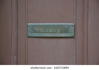Simple metal door mail slot with a czech sign "Listy" - Shutterstock ID 1425713894
