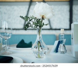 Simple minimalistic floral arrangement in glass vase.  - Powered by Shutterstock