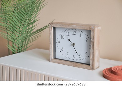 simple modern clock on table 