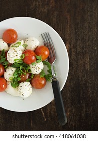 Simple Mozzarella and Tomato Salad. - Shutterstock ID 418061038
