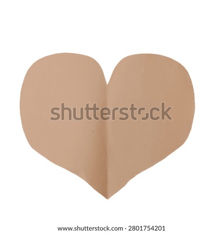 A simple paper heart shape with a soft shadow on a beige background, symbolizing love and affection.