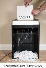 Simple Paper Vote Being Shredded As A Wasted Vote In An Office Shredder