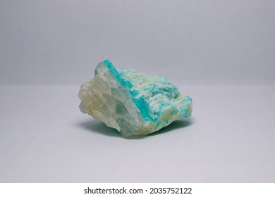 A Simple Photo Of Microcline With A White Background. 