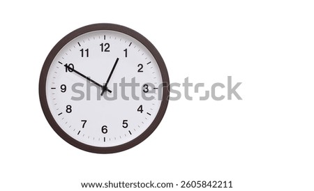A simple round wall clock with a dark brown frame and a white face displaying 00.50, 12.50. Isolated on a white background, perfect for time-related concepts, deadlines, and schedule themes.