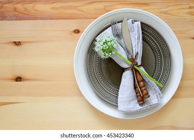 Simple Rustic Summer Season Table Setting Decorated With Onion Flower, Top View