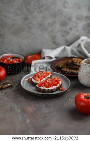 Similar – Tomatencremesuppe in roter Schüssel auf Grunge-Hintergrund