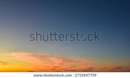 Simple sky composition showing warm sunset gradients and delicate clouds, offering a soothing and modern atmospheric background.