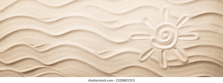 Simple sun drawing in the sand - Powered by Shutterstock