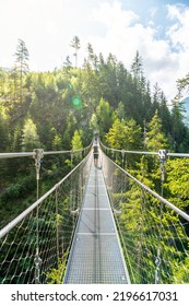 Simple Suspension Footbridge Over Mountain Valley