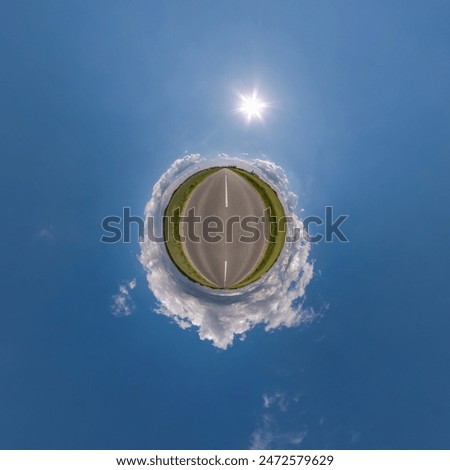 simple tiny planet without buildings in blue sky with beautiful clouds. Transformation of spherical panorama 360 degrees. Spherical abstract aerial view. Curvature of space.