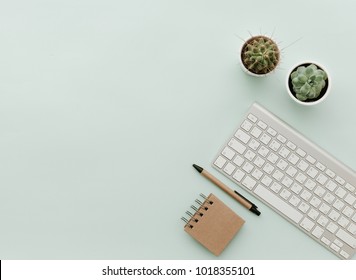 Simple Trendy Office Desk With Keyboard, Eco Craft Office Elements And Potted Flower. Home Office Desktop